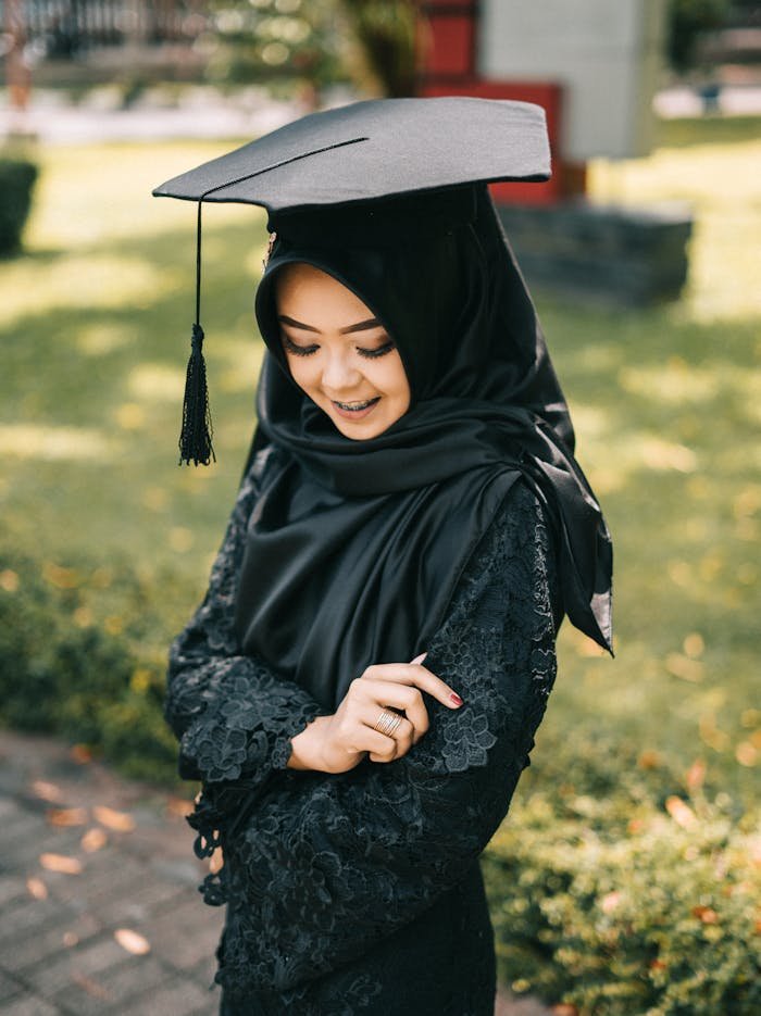 Selective Focus Photography of Woman Wearing Square Academic Cap